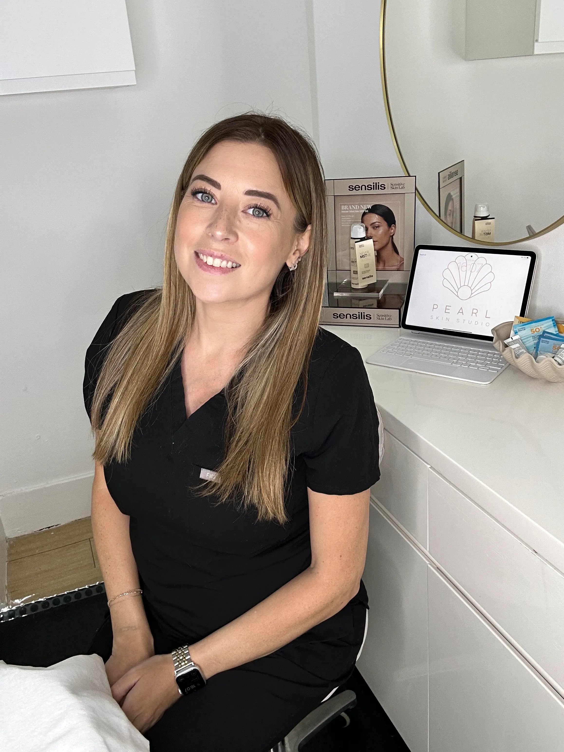 Emma, founder of Pearl Skin Studio, in her treatment room
